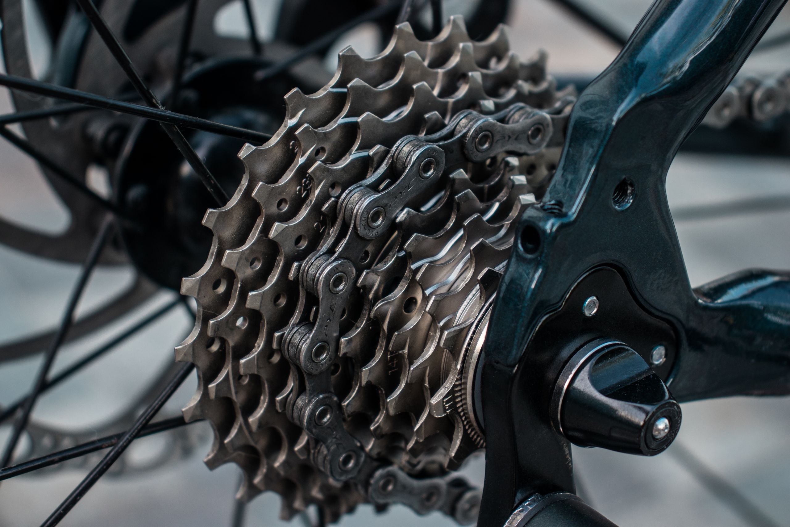 Detailed view of a bicycle's metal gear mechanism showcasing its intricate design.